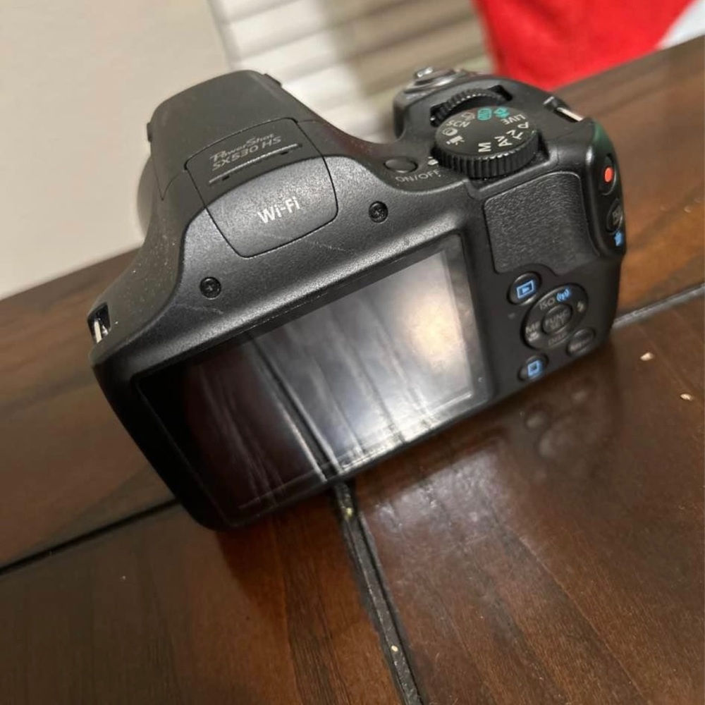 Canon Camera barely used with charger and box